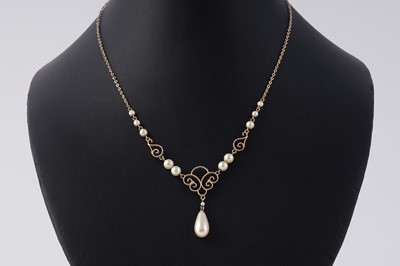 Lot 5 - A 1930's faux pearl and 9ct rose gold pendant necklet