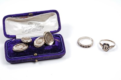 Lot 83 - A 9ct gold initial "B" signet ring; a 9ct gold eternity ring; and a pair of 9ct gold cufflinks