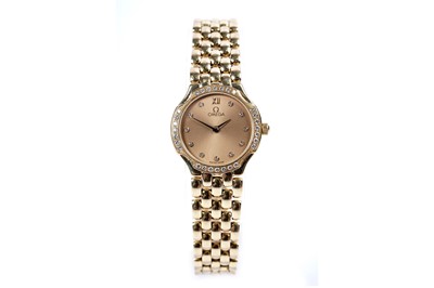 Lot 770 - Omega De Ville: an 18ct yellow gold diamond set lady's wristwatch