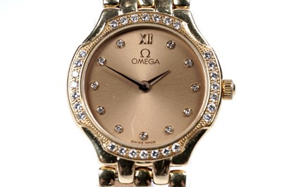 Lot 770 - Omega De Ville: an 18ct yellow gold diamond set lady's wristwatch