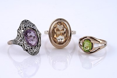 Lot 13 - A 1920's Art Deco amethyst ring; and two others