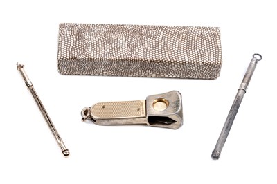Lot 248 - Two swizzle sticks, one 9ct gold; and a cigar cutter