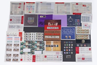Lot 423 - A selection of UK Royal Mail mini-sheets, part sheets, presentation books, and other items