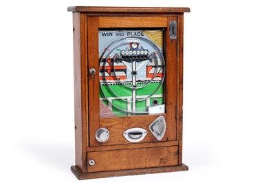 Lot 47 - A 1950’s Wondermatic ‘Win and Place’ oak cased penny slot pinball machine