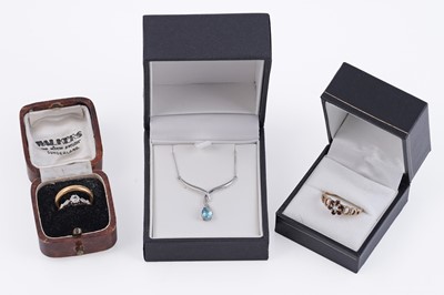 Lot 218 - A selection of rings; and a blue topaz and diamond necklace