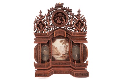 Lot 326 - A Chinese carved sandalwood frame
