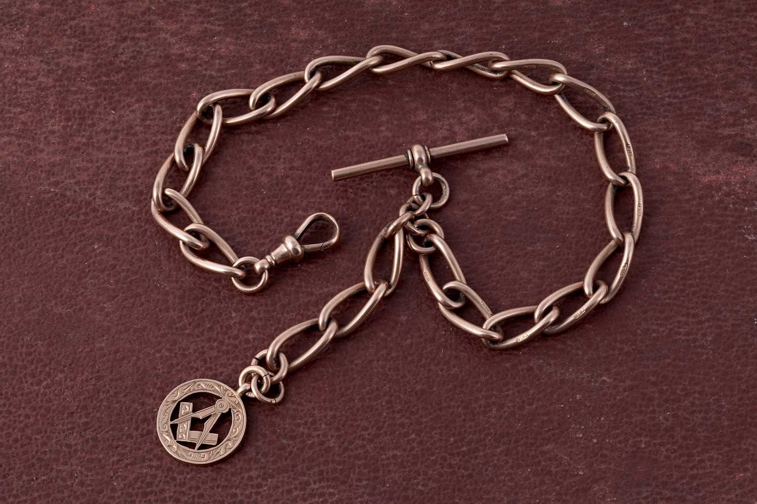 Lot 31 - An early 20th Century 9ct rose gold curb-link "Albert" watch chain