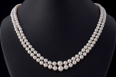 Lot 36 - A two-strand cultured pearl necklace, with a 9ct gold clasp