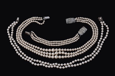 Lot 85 - A Mikimoto two-strand cultured pearl necklace