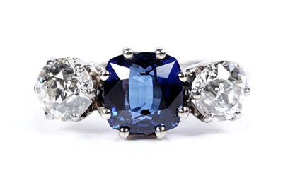 Lot 947 - A Burmese sapphire and diamond ring
