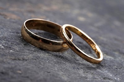 Lot 81 - A 22ct gold wedding ring; and an 18ct gold wedding ring