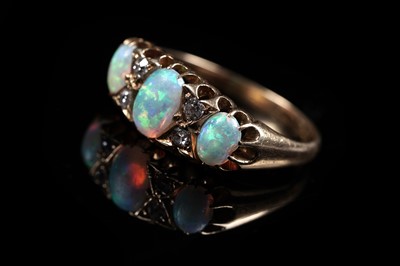Lot 880 - An Edwardian opal and diamond ring