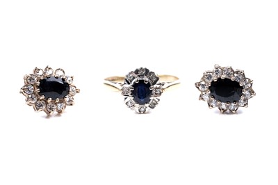 Lot 82 - A sapphire and diamond ring; and a pair of sapphire earrings