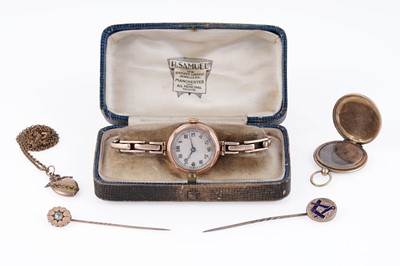 Lot 270 - A 1930s lady's 9ct rose gold dress watch; an Edwardian pendant; locket; and stick pins