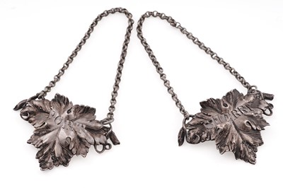 Lot 272 - A pair of early Victorian silver vine leaf wine labels