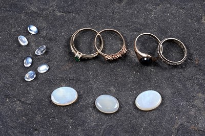 Lot 192 - A selection of rings; and a selection of opals and moonstones