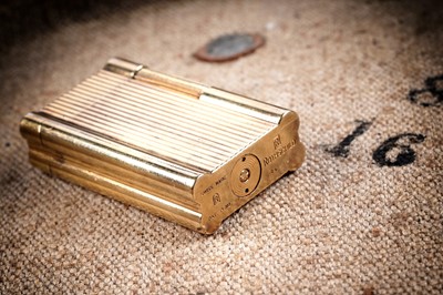 Lot 463 - A Rothschild Swiss made gold-plated lighter