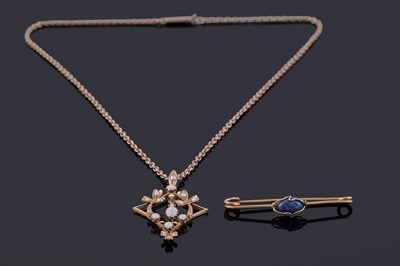 Lot 6 - An Edwardian opal and seed pearl openwork pendant