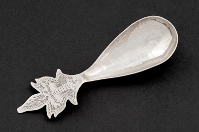 Lot 227 - A George V art and crafts silver caddy spoon