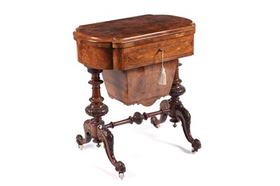 Lot 603 - A Victorian burr walnut games/work table