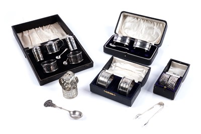 Lot 573 - Silver cruet sets and napkin rings