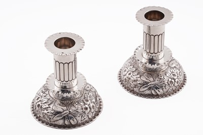 Lot 191 - A pair of late Victorian dwarf or dressing table candlesticks