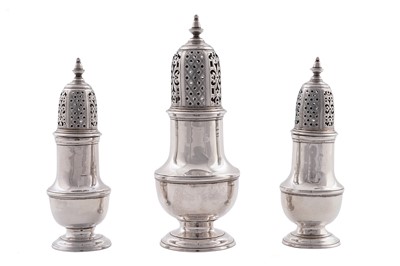 Lot 192 - A set of three George II silver casters