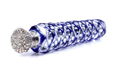 Lot 722 - A Victorian silver mounted clear glass scent bottle