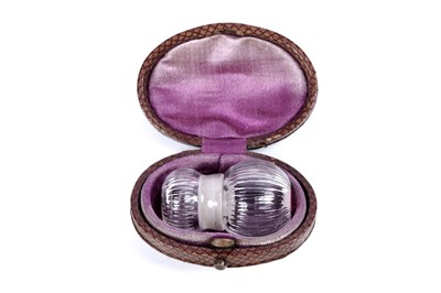 Lot 723 - A late 19th Century small clear glass scent bottle