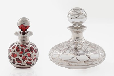 Lot 726 - A small Edwardian ruby glass globular scent bottle and stopper