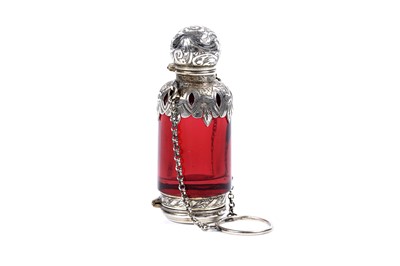 Lot 732 - A Victorian silver-gilt mounted cranberry glass scent bottle and vinaigrette combined