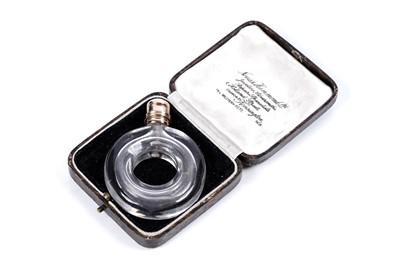 Lot 734 - A George III gold mounted clear glass scent bottle