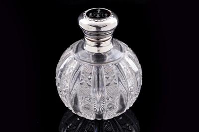 Lot 744 - An Edwardian silver mounted cut glass dressing table bottle