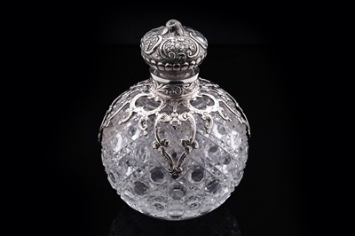 Lot 745 - A late Victorian silver mounted cut glass toilet water bottle