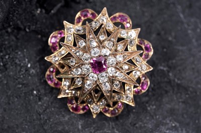Lot 979 - A Victorian ruby and diamond star pattern brooch