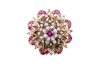 Lot 979 - A Victorian ruby and diamond star pattern brooch