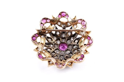 Lot 979 - A Victorian ruby and diamond star pattern brooch