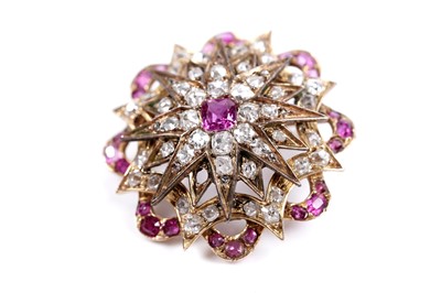 Lot 979 - A Victorian ruby and diamond star pattern brooch