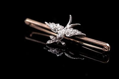Lot 981 - A Victorian diamond bird of peace bar brooch