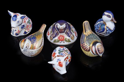 Lot 278 - A collection of six boxed Royal Crown Derby paperweights