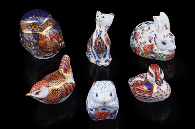 Lot 279 - A collection of six boxed Royal Crown Derby paperweights