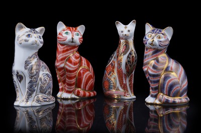 Lot 281 - A collection of four Royal Crown cat paperweights