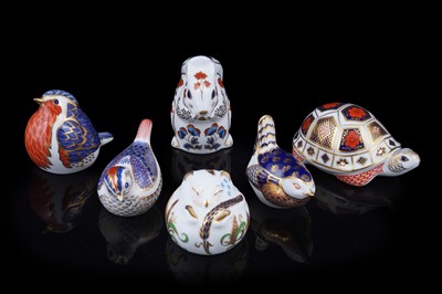 Lot 283 - A collection of six boxed Royal Crown Derby paperweights
