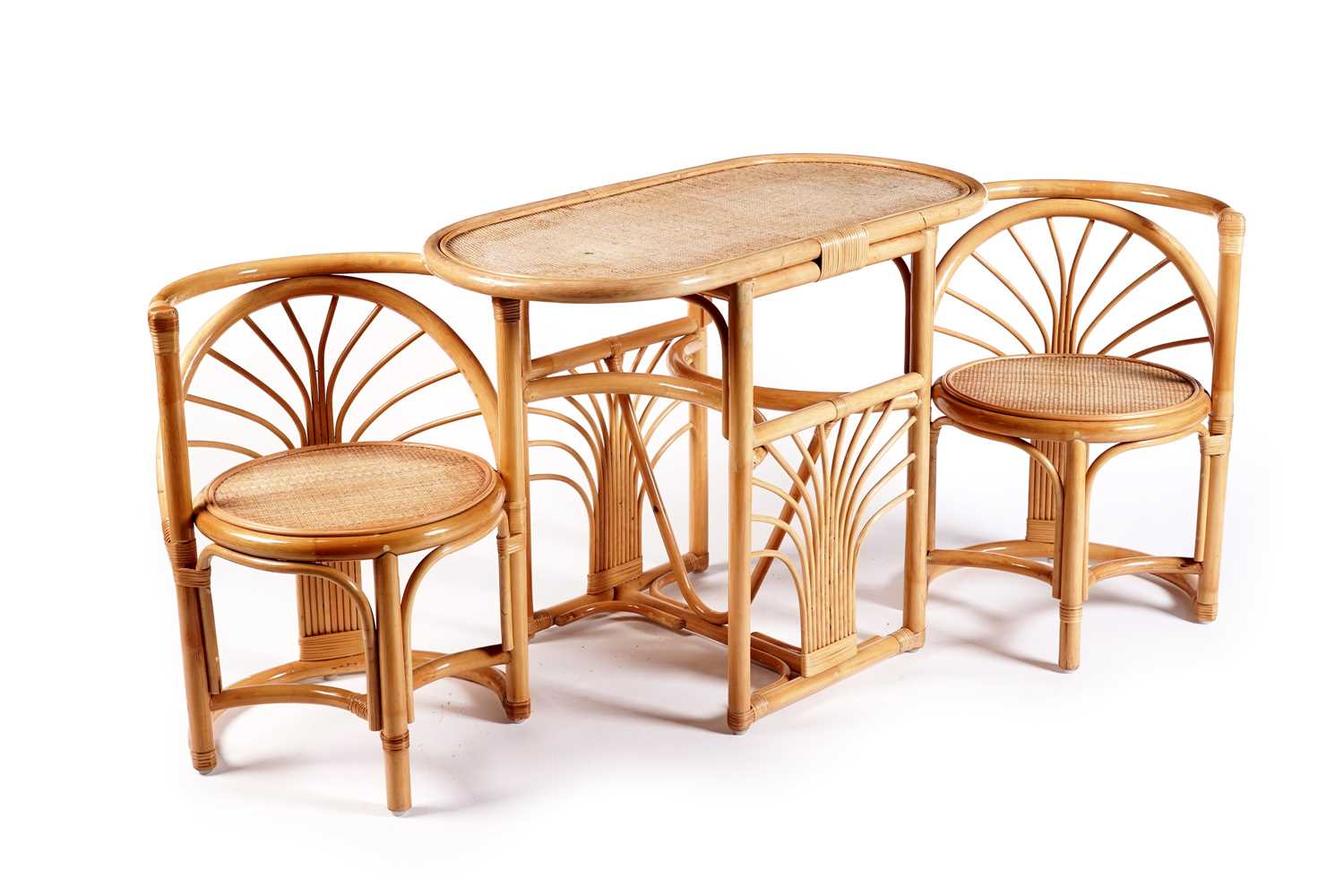 Lot 17 - A 20th Century bamboo and rattan table and tuck under chairs