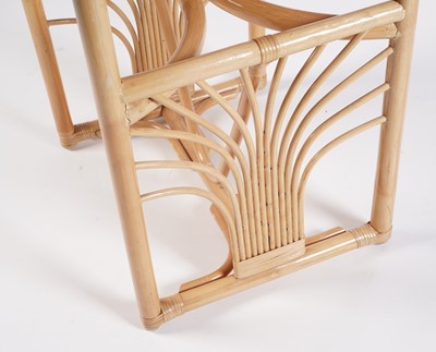 Lot 17 - A 20th Century bamboo and rattan table and tuck under chairs