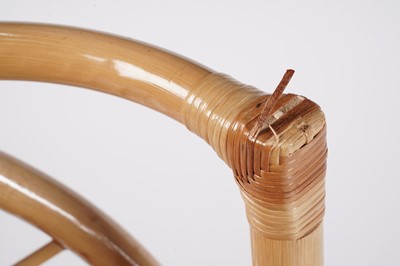 Lot 17 - A 20th Century bamboo and rattan table and tuck under chairs