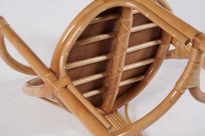 Lot 17 - A 20th Century bamboo and rattan table and tuck under chairs