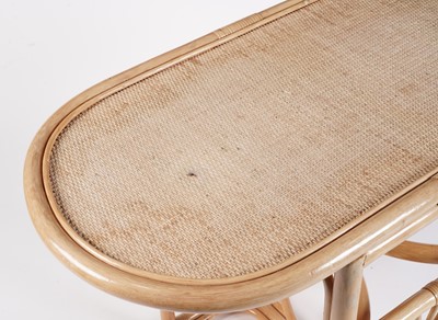 Lot 17 - A 20th Century bamboo and rattan table and tuck under chairs