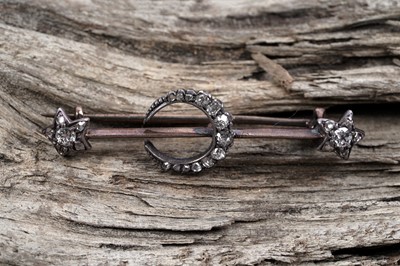 Lot 847 - A Victorian diamond crescent and star bar brooch