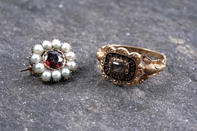 Lot 848 - A George IV mourning ring; and a garnet and half-pearl cluster brooch